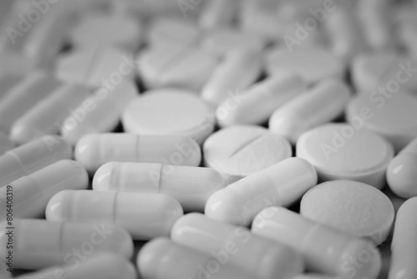 Obraz White pills on blue background