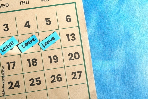 Obraz Annual leave from office work concept. Written reminder note on calendar.