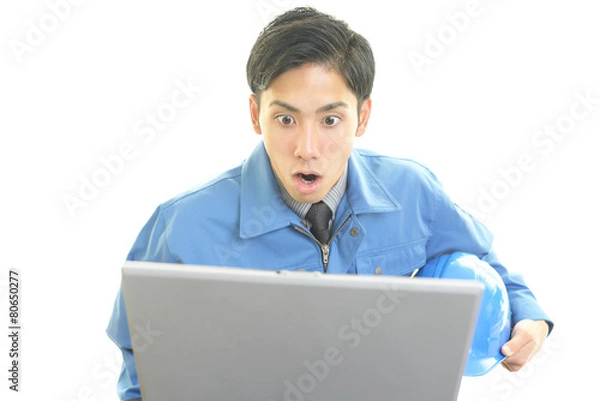 Fototapeta 驚いた表情の労働者