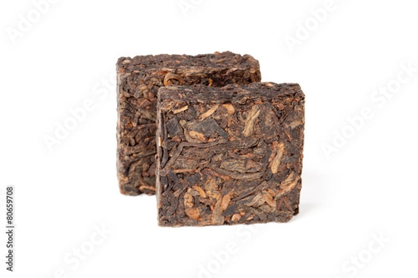 Fototapeta Two pressing briquette of Chinese Shu Pu Erh tea