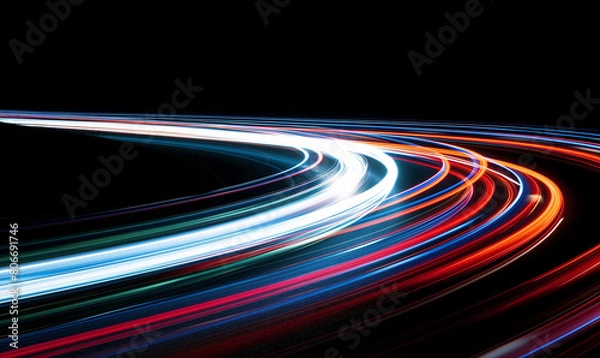 Obraz A colorful light trail on black background, long exposure photography, wind style, swirling lines, flowing curves