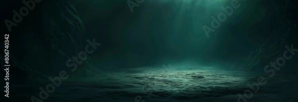 Fototapeta Banner, A dark green, empty room with a faint green light shining from the bottom right corner of frame. floor rough dirt and sand. dim glow of an unknown source kind of underwater rocks or ocean bed