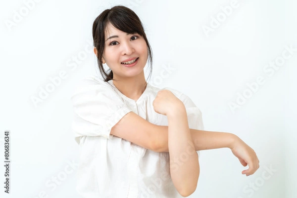 Obraz 自宅で伸びをする女性