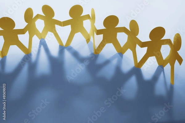 Obraz Team holding hands together