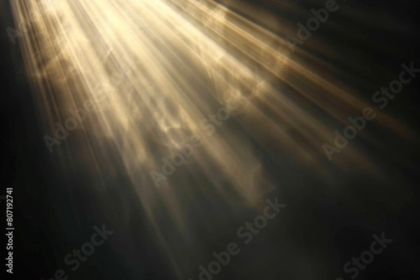 Fototapeta Sun rays isolated on black background for design overlay.