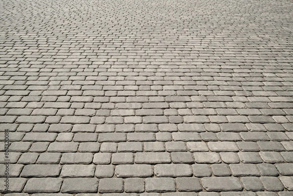 Obraz Stone pavement texture in perspective. Abstract background of old cobblestone pavement.