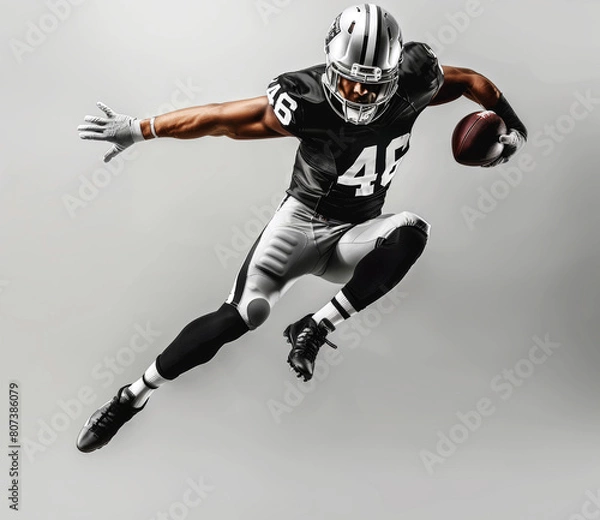 Fototapeta Dynamic Action Shot of a Professional Football Player in Full Gear During a Game, Demonstrating Speed and Agility
