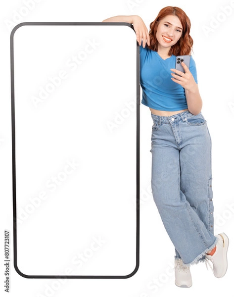 Obraz Mobile app offer, happy caucasian red bob hair girl leaning empty blank touch screen huge big mobile phone mock up. Recommending app, advertising, website. Transparent png image.