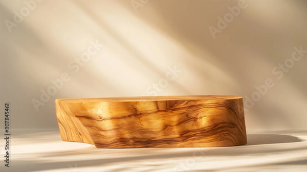 Fototapeta Minimalistic Tranquility: Olive Wood Podium in Empty Space with Serene Leaf Shadow