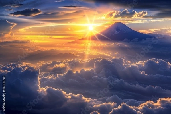 Obraz 雲の上に頭を出した富士山と日の出・朝日