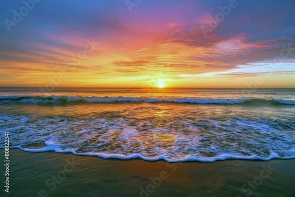 Fototapeta Sunset painting the sky with hues of orange, pink, and purple, signaling the end of summer day