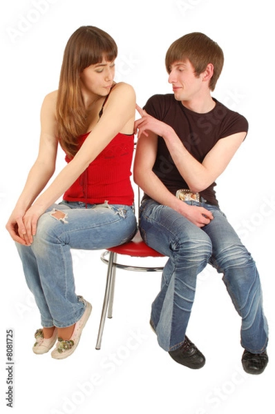 Fototapeta A guy is sorry to a beautiful girl