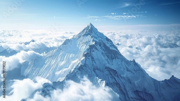 Obraz A mountain peak reaching towards the sky, representing challenges, aspirations, and the pursuit of higher goals