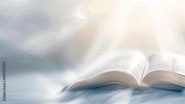 Obraz A book is open to a page with a white background