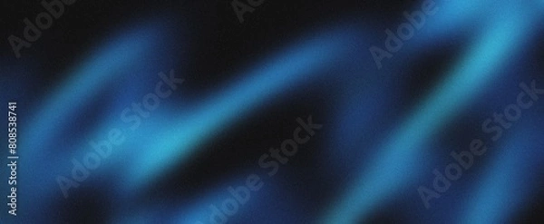 Fototapeta Blue gradient background grainy glowing blue light on dark backdrop noise texture effect banner header design.
