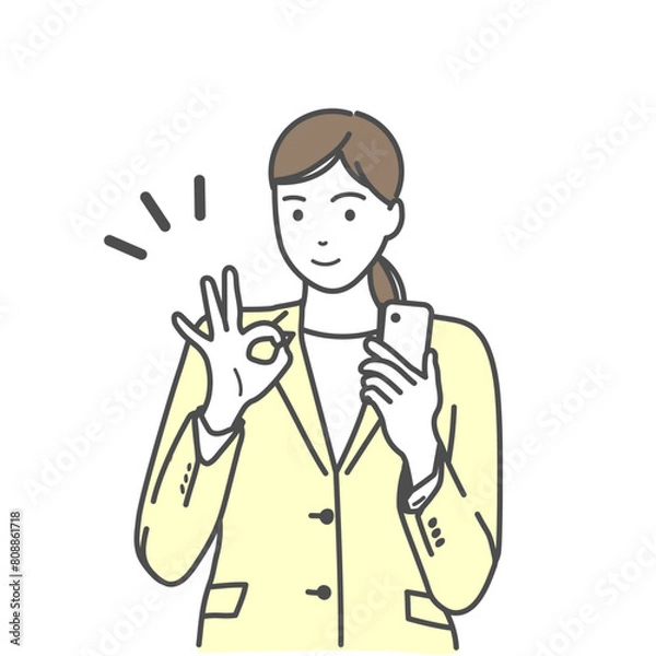 Fototapeta スマホを持ち指でオーケーサインを出す笑顔のスーツ姿の女性　白バック、白背景、背景なし、シンプル	