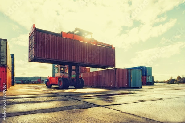 Fototapeta Loading and unloading of containers in the port