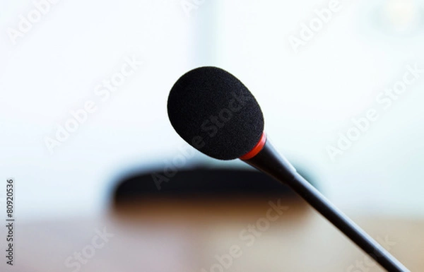 Fototapeta Close up of microphone in auditorium.
