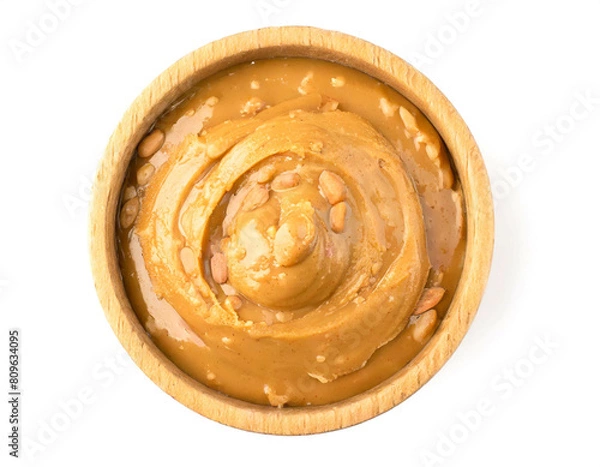 Fototapeta Erdnussbutter in holzschlae isoliert auf weißen Hintergrund, Freisteller, draufsicht 
