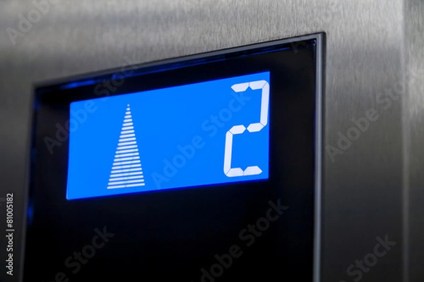 Obraz Reaching second floor with an elevator.