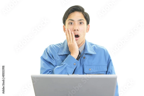 Fototapeta 驚いた表情の労働者