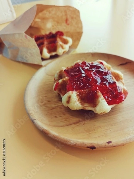 Fototapeta Breakfast of waffle with strawberry jam