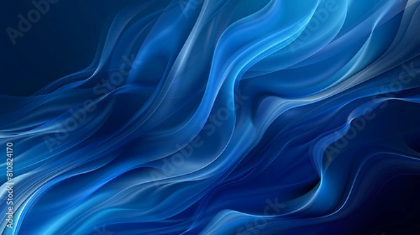 Fototapeta Dark blue tissue develops against blue background. The elegant shape of the fabric creates wave effect.
