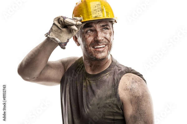 Fototapeta Young dirty Worker Man With Hard Hat helmet