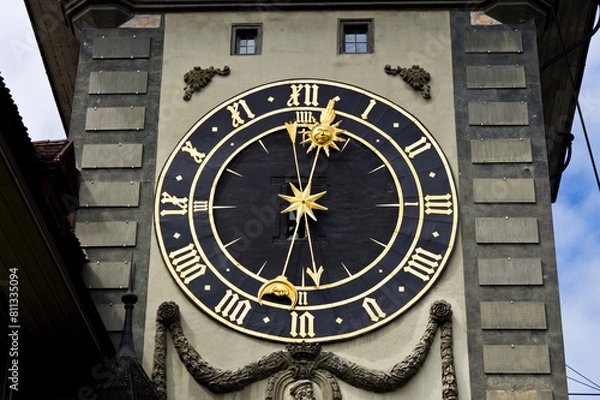 Fototapeta Golden and black clock in Bern, Switzerland