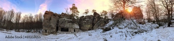 Obraz Dovbush rocks in winter in Bubnyshche, Carpathians, Ukraine, Europe. Huge stone giants rise in the snowy transparent beech forest, all-round panoramic views are unique without leaves
