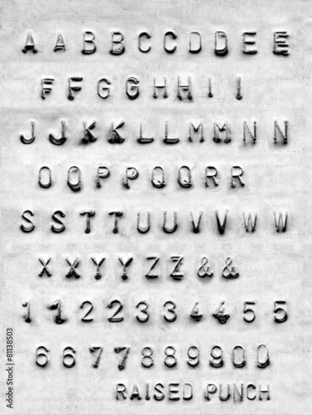Obraz Punched raised type