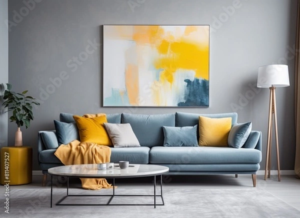 Fototapeta Living room with an azure couch and a painting on the wall