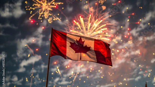 Fototapeta Canadian flag close-up against the background of festive fireworks	