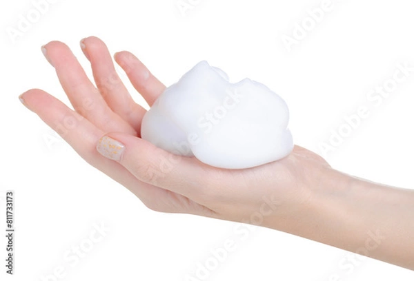 Obraz White foam mousse on hand on white background isolation
