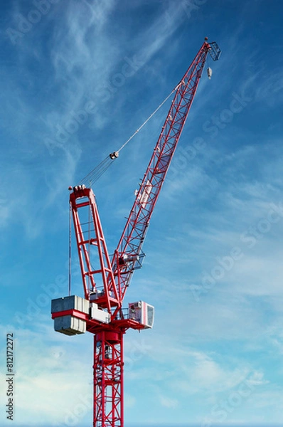 Obraz Tower crane high in sky at construction site