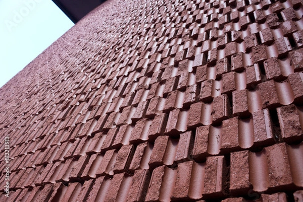 Fototapeta Texture of a wall made of rough bricks