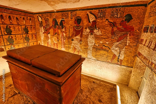 Fototapeta Sarcophagus of Pharoah Tutankhamun with wall reliefs from the Book of the Dead inside the famous Tomb of Tutankhamun,KV62,discovered by Howard Carter in 1922 in the Valley of Kings at Luxor,Egypt