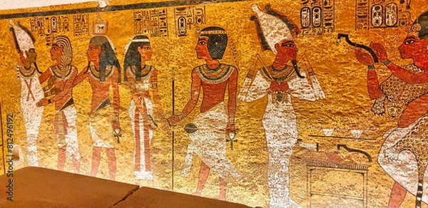 Fototapeta Painted wall relief depicting Tutankhamun and his soul,Ka,embracing Osiris and Goddess Nut inside the famous Tomb of Tutankhamun,KV62,found by Howard Carter in 1922 in the Valley of Kings,Luxor,Egypt