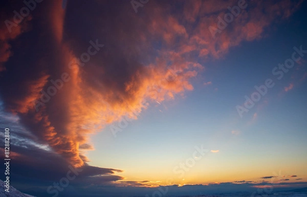 Fototapeta sunset color and shape of clouds resembling a fire in the sky