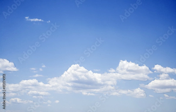 Fototapeta Blue sky background with clouds in spring