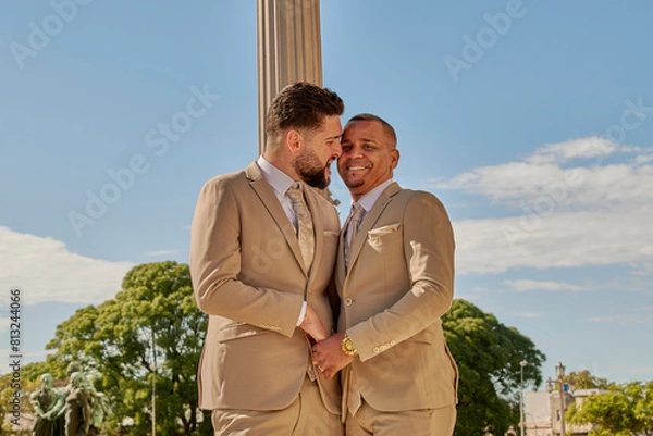 Fototapeta Portrait of two boys celebrating diversity day, they belong to the lgbt community and have just got married.