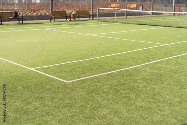 Fototapeta View of multi-functional sports area with tennis courts