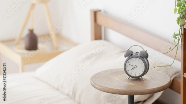 Fototapeta 目覚まし時計とベッド