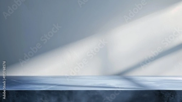 Fototapeta Table in the studio room. 3d empty blue podium on a background of a white concrete wall. Marble platform for product. Mockup with tabletop for cosmetics presentation.