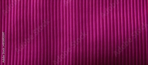Fototapeta Close up copy space image of a fuchsia colored ribbed cotton fabric showcasing its texture and pattern This natural and organic textile background is made of rib cotton cloth