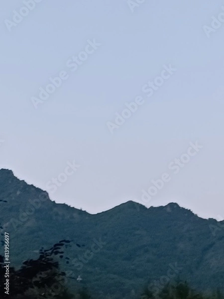 Fototapeta mountains and clouds