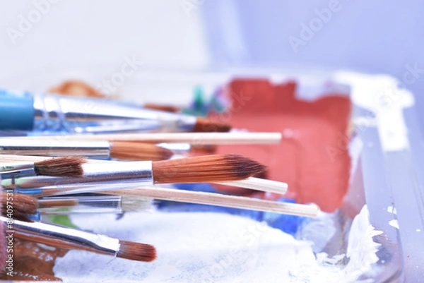 Fototapeta a set of dirty brushes and paintbrushes from having painted too much