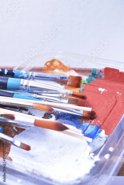 Fototapeta a set of dirty brushes and paintbrushes from having painted too much