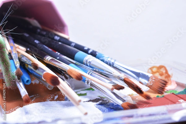 Fototapeta a set of dirty brushes and paintbrushes from having painted too much