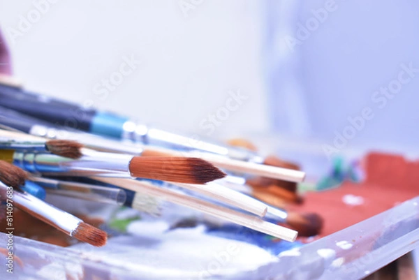 Fototapeta a set of dirty brushes and paintbrushes from having painted too much